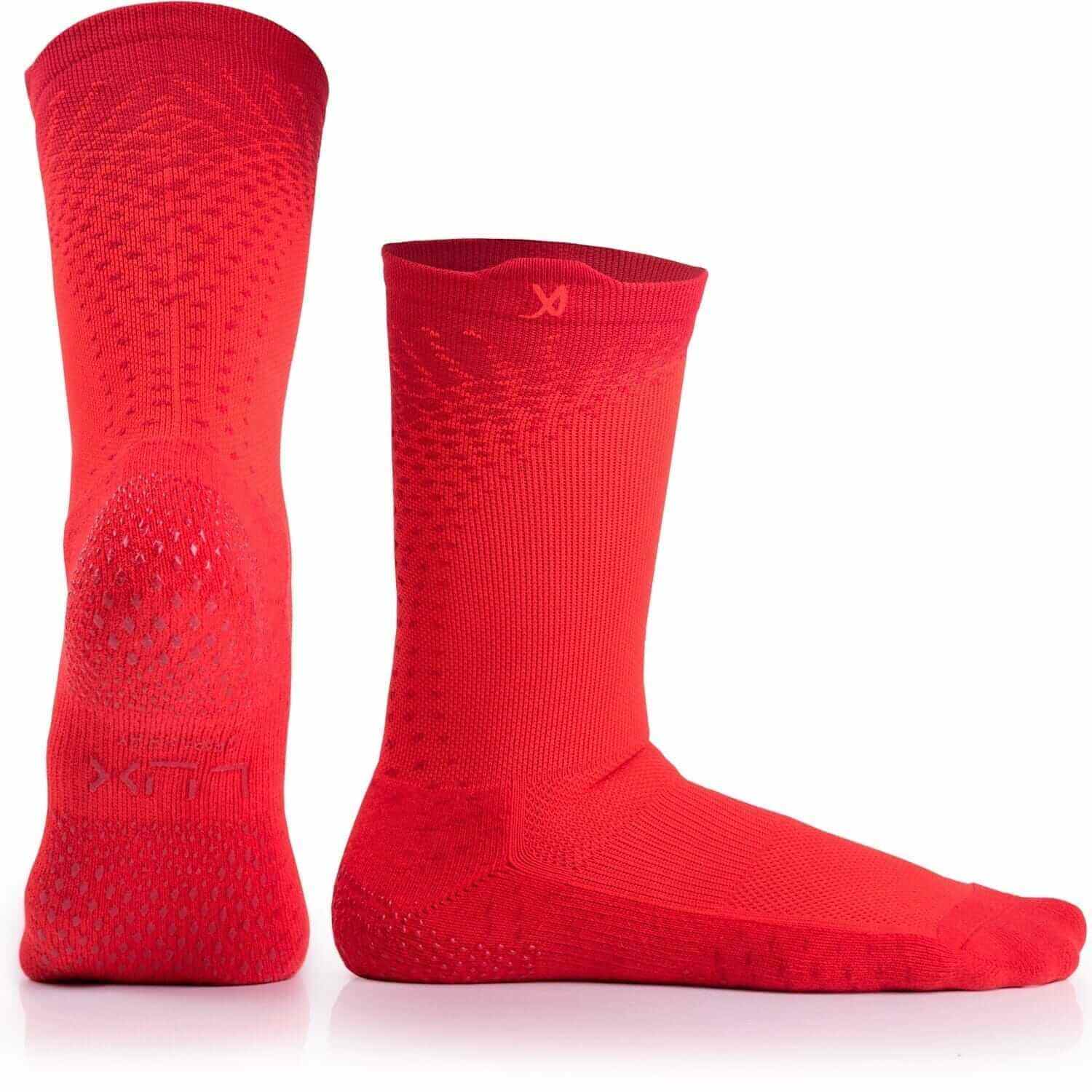 High-intensity football training with Performance Grip Cleat Socks for added grip
