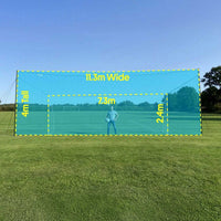 Full size football goal with integrated backstop net for training and rebound control on large grass field