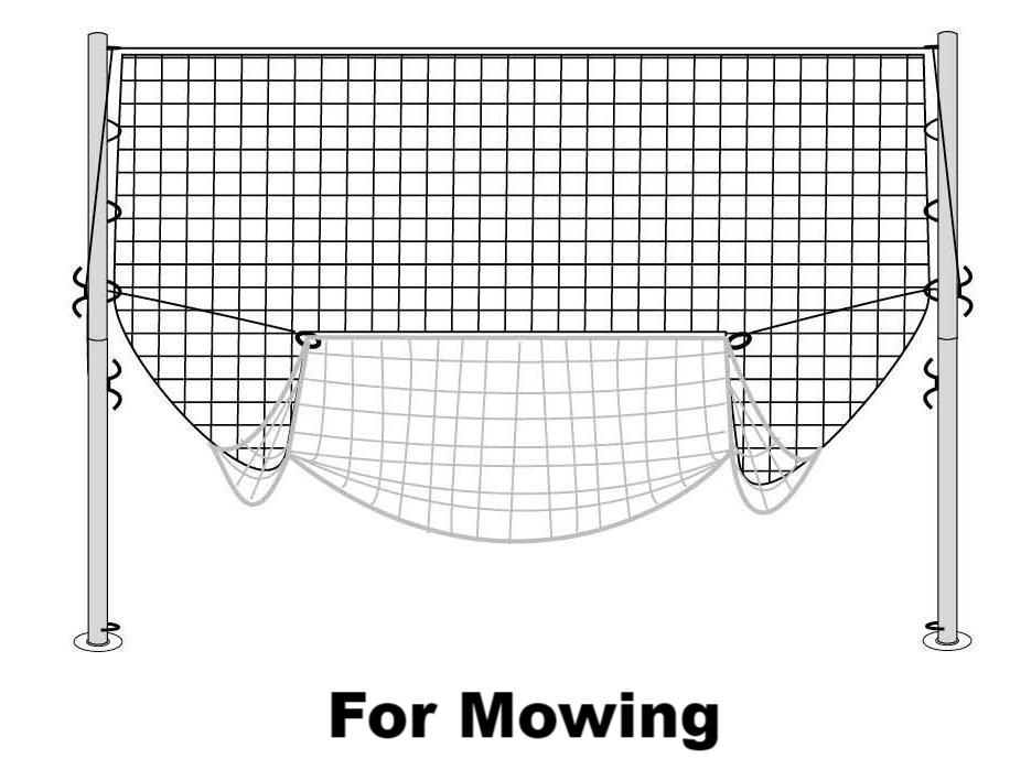 Football goal for the garden set up next to flower beds and grass