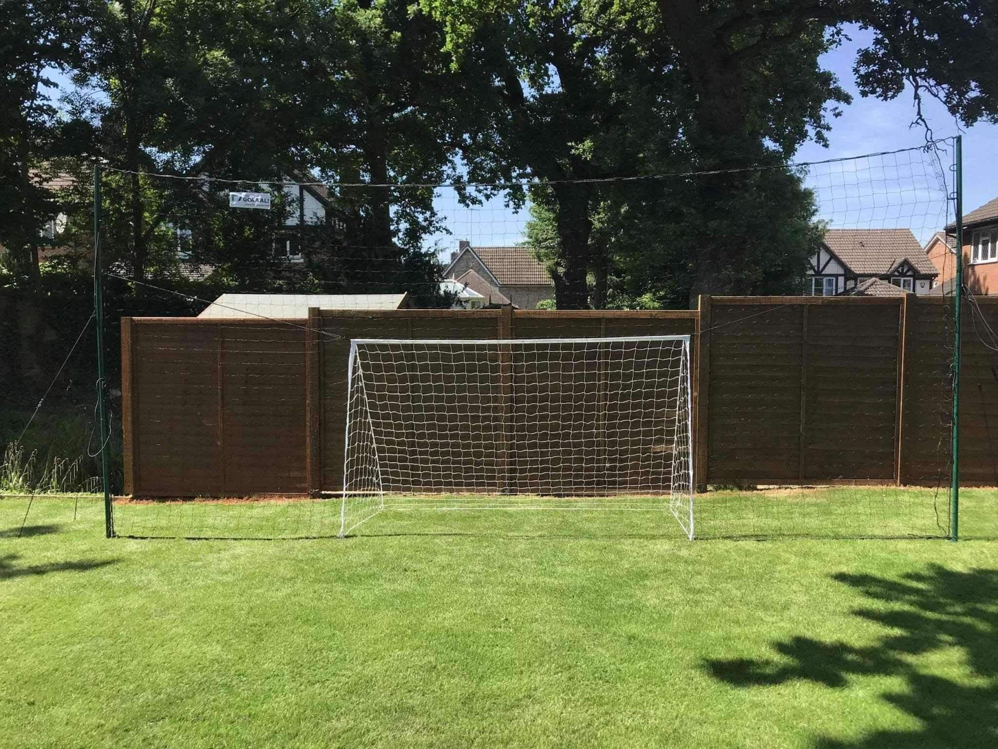 Football goal with backstop netting Open Goal. Open Goaaal!