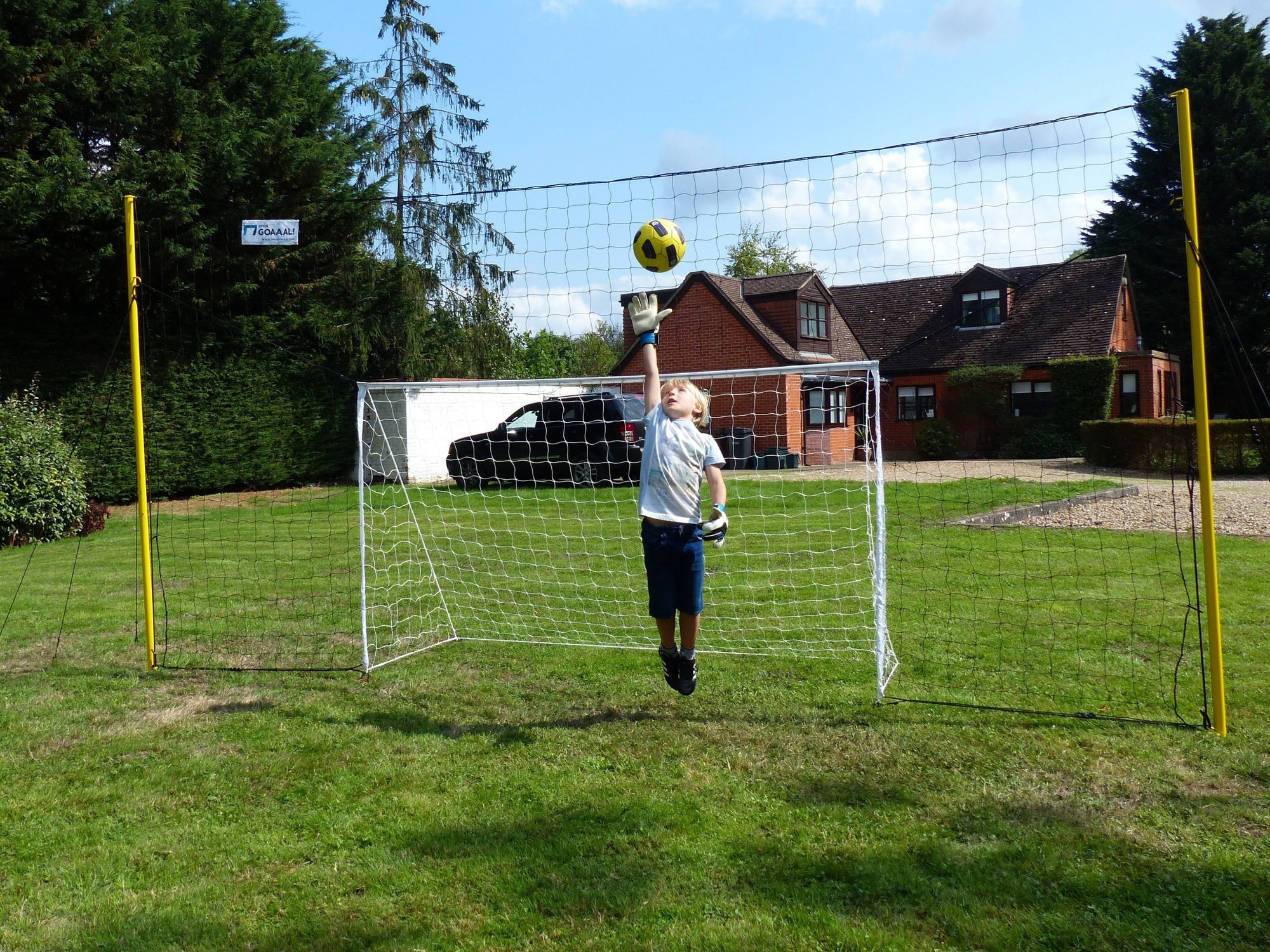 Junior - 8' x 4.5' Football Goal, in 8' high Backstop/ Rebounder